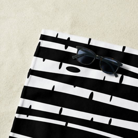 Schuif het zwarte witte boompatroon met het muisbl strandlaken (In situ)