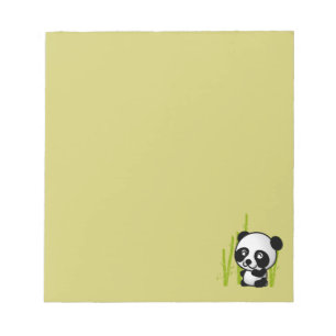 Schuif zwart-wit panda-beer in een bamboegroef. notitieblok