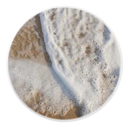 Schuimschuim op het strand keramische knop (Voorkant)