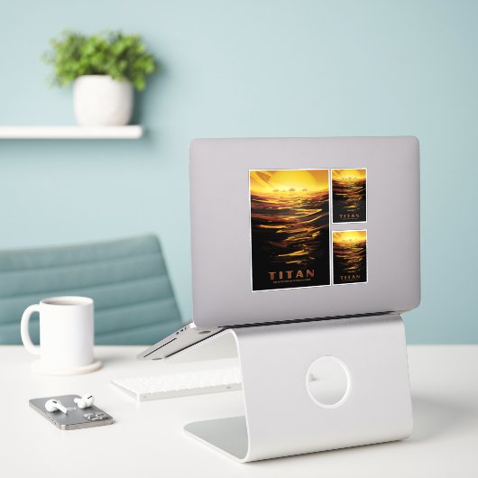 Sci-Fi Travel Ad, Moon Titan Sticker (Laptop op bureau)