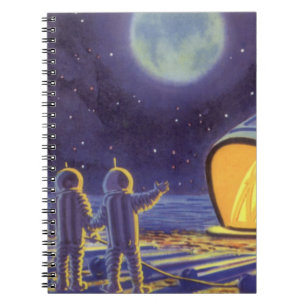 Sciencefictionaliens uit vroeger tijden op de blau notitieboek