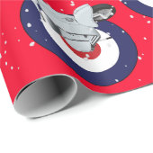 Scooter op rode omhulling met vallende sneeuw cadeaupapier (Rol Hoek)