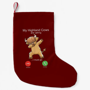 Scottish Highland Cow roept Kleine Kerstsok