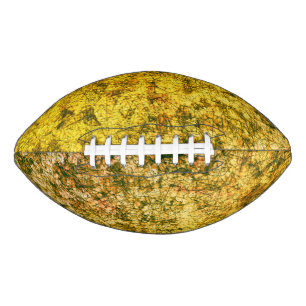 Scratches op een lichtgevlekte zwarte gele american football