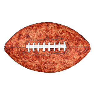 Scratches op krassen op een licht gevlekt koraal american football
