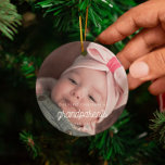 script Ons Eerste Kerstfeest als grootouders Keramisch Ornament<br><div class="desc">Een retro-typografie en een modern design voor dit fotoornament cadeau. Om aan te passen met uw favoriete baby afbeelding. U kunt de kleur van de doopvont in uw het houden ook gemakkelijk veranderen. Ideaal om je eerste kerstfeest te vieren als nieuwe grootouders.</div>