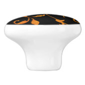 Scrollende roest en zwart keramische knop (Zijkant)