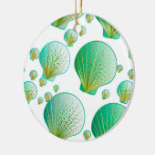 Seafoam groene zeeschelpen op wit keramisch ornament (Links)