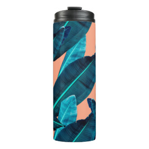 Seamless tropical flower, plant and leaf pattern b thermosbeker