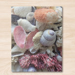 Seashells Legpuzzel<br><div class="desc">Deze  puzzel is versierd met een collectie roze,  witte en bruine zeeschelpen en koraal dat op de stranden van de Seychellen is gestrooid. U kunt deze puzzel aanpassen door de foto met één van uw eigen shell collectie of om het even welke foto te vervangen u verkiest.</div>