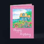 Seaside Cottage Happy Birthday Friend Kaart<br><div class="desc">Een  wenskaart met een klein blauw huisje bij het zee met een zeilboot in het water en felrode zoete erwten in bloei,  vermengd met lupine en roze wilde bloemen op een zomerdag getekend met sepia-inkt en beschilderd met waterverf.</div>