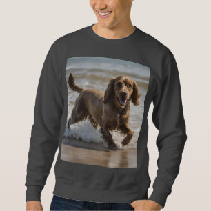 Seaside Fun: Cocker Spaniel bij Play in the Ocean Trui