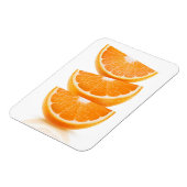 Segmenten van sinaasappel in een stapel magneet (Linkerzijde)