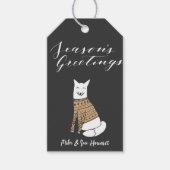 Seizoenen met een zwarte kerstcadeautas van Wolf Cadeaulabel (Voorkant)