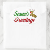 Seizoensgroeten die met Kerstmis in het rendiertje Ovale Sticker (Tas)
