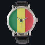Senegal Flag Horloge<br><div class="desc">De Senegalese vlag is een verticale drieband met in het midden een enblem. De gebruikte kleuren in de vlag zijn rood,  groen,  geel. Het aandeel van de Senegalese vlag is 2:3. De vlag van Senegal werd in 1960 aangenomen.</div>
