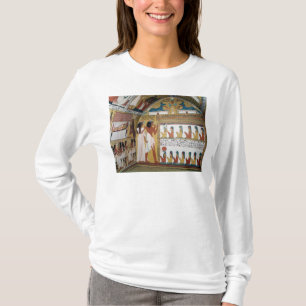 Sennedjem en zijn vrouw tegenover een naos t-shirt