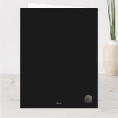 Serene snowy landscape illuminated by lit trees kaart (Achterkant)