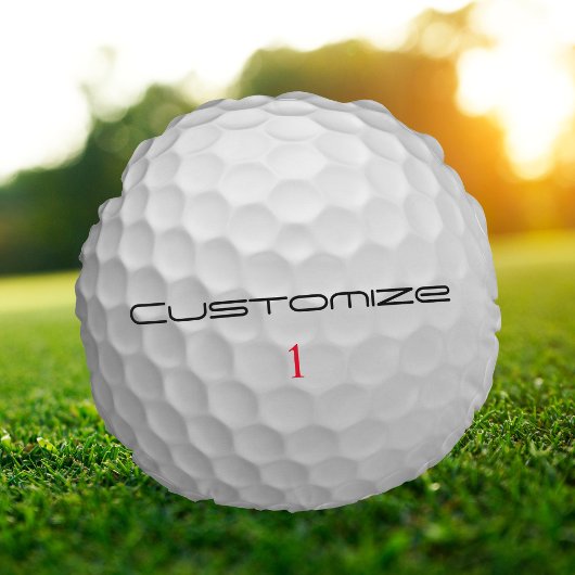 Serie 1 gepersonaliseerde golfbalcadeaus met handt rond kussen