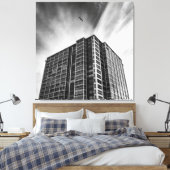 Shadows and Steel: The Silent Giant in the City Canvas Afdruk (Insitu (Slaapkamer))