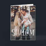 Shalom White Lettering Overlay Happy Hanukkah Feestdagen Kaart<br><div class="desc">Happy Hanukkah! Verstuur vakantiewensen en groeten naar familie en vrienden met deze fotovakantiekaart met 'Shalom'-bedekking. Personaliseer door namen,  bericht en foto's toe te voegen. Dit ontwerp is beschikbaar als een platte kaart,  een gevouwen kaart en een briefkaart.</div>