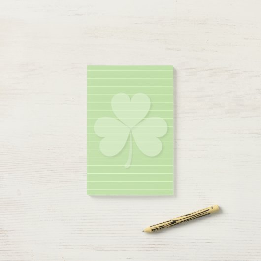 Shamrock met gerolde lijnen post-it® notes (Op bureau)