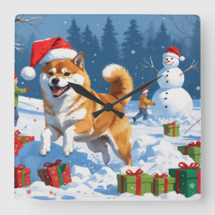 Shiba Inu rent in de sneeuw met kerstmuts Vierkante Klok