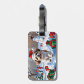 Shih Tzu hardlopen in de sneeuw met kerstmuts Bagagelabel (Achterkant verticaal)