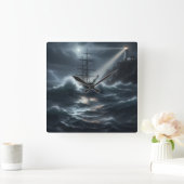 Ship in a storm guided by lighthouse - vierkante klok (Huis)