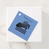 Show jumper die een obstakel opruimt. bedankjes labels (In situ)