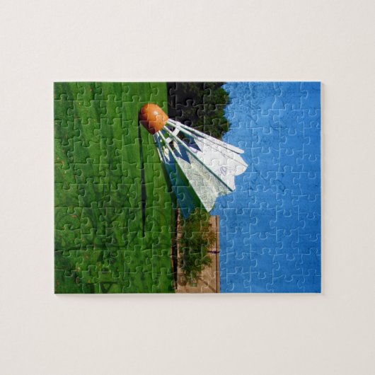 Shuttlecock op het gras legpuzzel (Horizontaal)