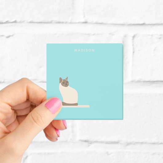 Siamese kat op blauwe notities met naam post-it® notes