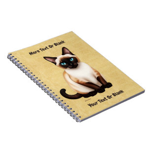 Siamese kat op oud papier notitieboek