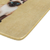 Siamese kat op oud papier snijplank (Hoek)
