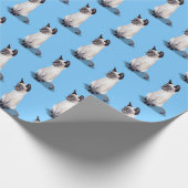 Siamese kitten op blauwe achtergrond cadeaupapier (Hoek)