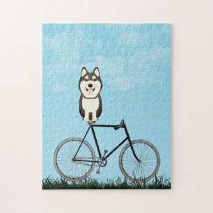 Siberian Husky Dog zit op de  fiets Legpuzzel