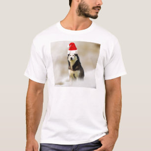 Siberische Husky Hond met Santa Hoed in Sneeuw T-shirt