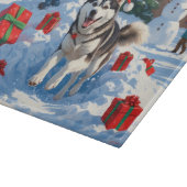 Siberische Husky loopt in de sneeuw met kerst Pet Snijplank (Hoek)