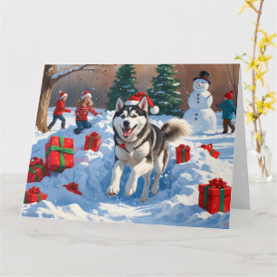 Siberische Husky Rent in de Sneeuw met Kerstmuts Kaart