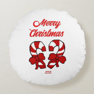 Sierkussen met kerstsnoepjes rond kussen