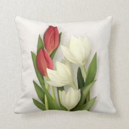Sierkussen van rode en witte tulpen