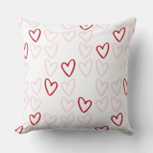 Sierkussen van rood en roze hart
