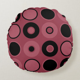 Sierkussen voor roze en zwarte cirkels rond kussen