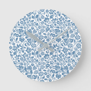 Sierlijk blauw en wit bloemmotief met ranken ronde klok