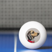 Sierlijke hond met rode halsband geposeerd zijwaar pingpongbal (Net)