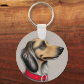 Sierlijke hond met rode halsband geposeerd zijwaar sleutelhanger (Achterkant)
