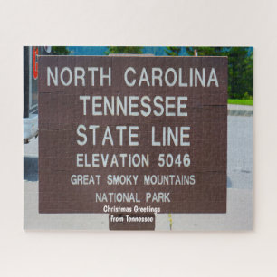 Signpost State Line Tennessee. Jigzaag Puzzle Legpuzzel