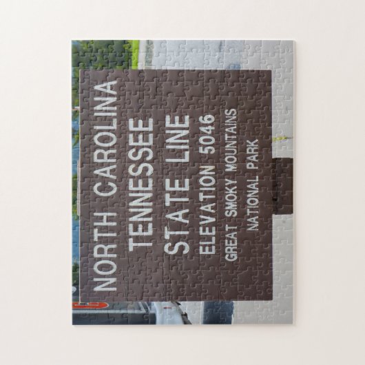 Signpost State Line Tennessee. Legpuzzel (Verticaal)