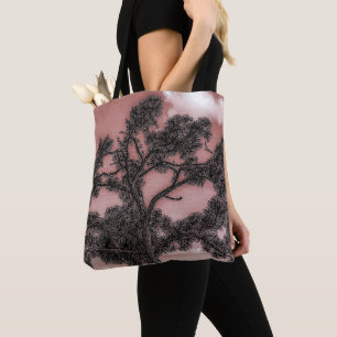 Silhouet van dennen- en palmbomen tote bag