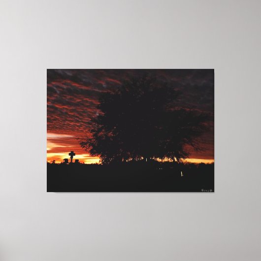 Silhouet van een boom bij schemering canvas afdruk (Voorkant)